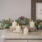 4 TruGlow® Ivory LED Votive Candles