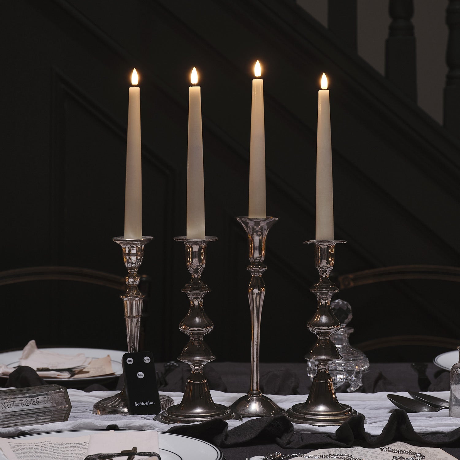 4 Ivory TruGlow® LED Taper Candles with Remote Control