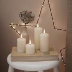 4 TruGlow® Ivory Slim Pillar Candles