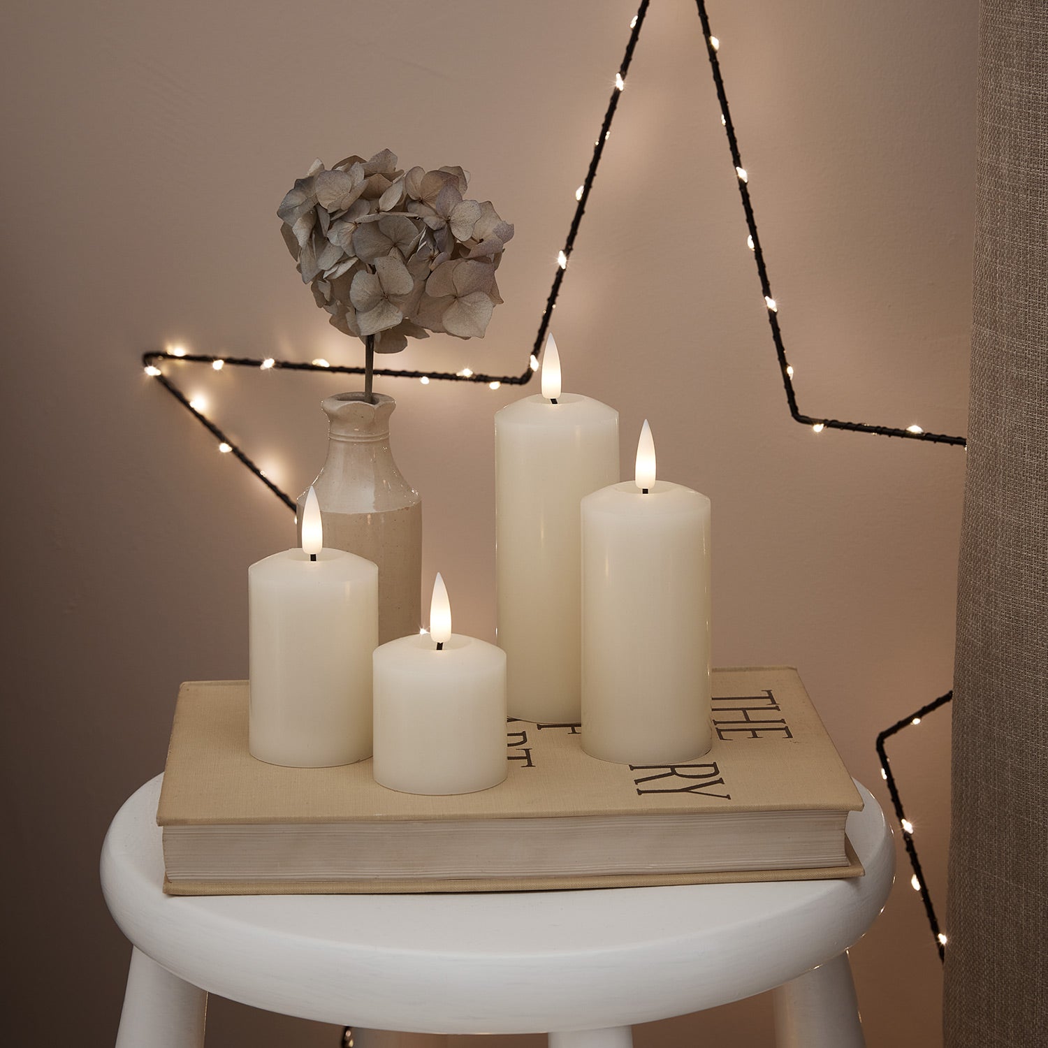 4 TruGlow® Ivory Slim Pillar Candles