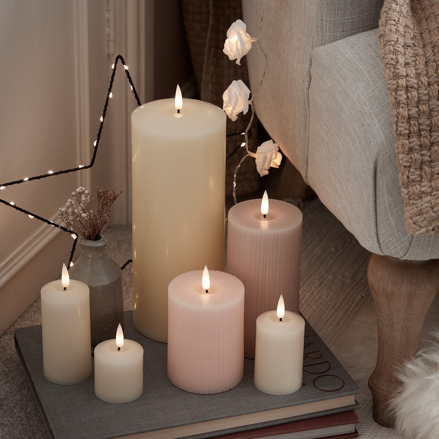 4 TruGlow® Ivory LED Votive Candles