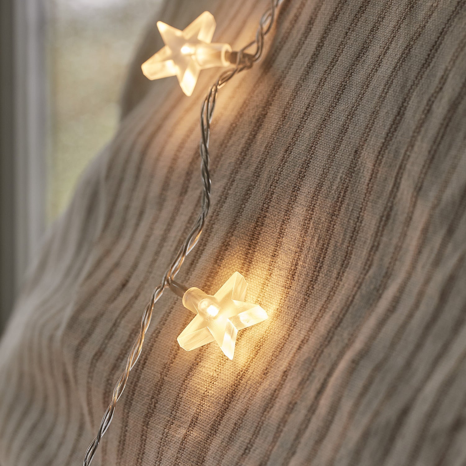 30 Warm White LED Star Fairy Lights On Clear Cable