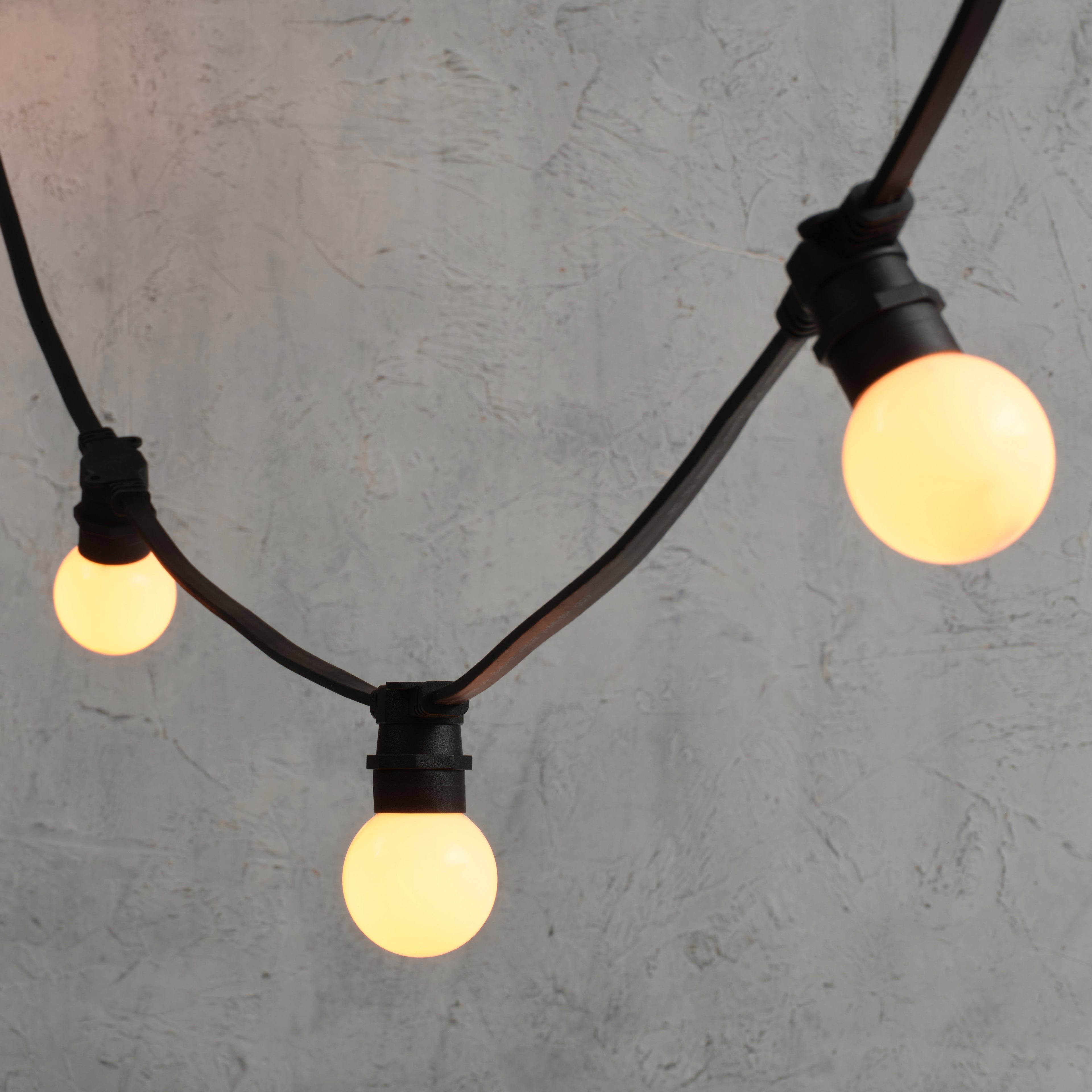 Plus Connect 5m 10 Warm White Connectable Festoon Lights G60 Bulb Frosted Cap Black Cable