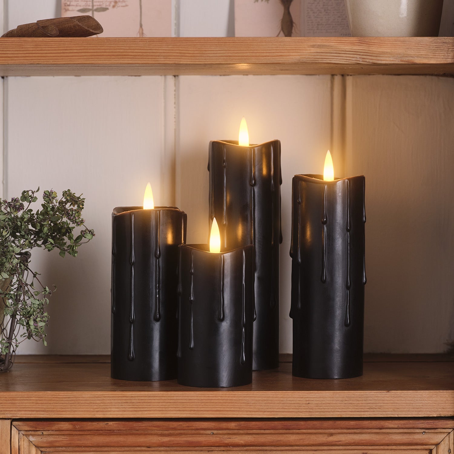 4 TruGlow® Black Dripping Wax LED Slim Pillar Candles